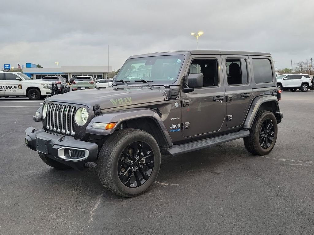 Used 2021 Jeep Wrangler Unlimited Sahara 4XE with VIN 1C4JJXP63MW643661 for sale in Houston, TX